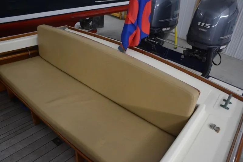 Slide: The Image of 1988 Bunker and Ellis 24 Open boat with beige seating and dual Yamaha 115 engines. - 18