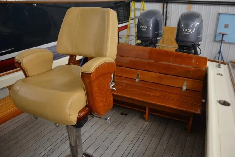 Slide: The Image of 1988 Bunker and Ellis 24 Open boat interior with leather seat and wooden bench. - 17