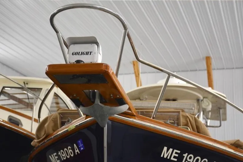 Slide: The Image of 1988 Bunker and Ellis 24 Open boat with Golight spotlight in storage. - 20