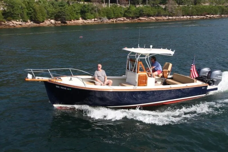 Slide: The Image of 1988 Bunker and Ellis 24 Open boat cruising on a scenic waterway. - 6