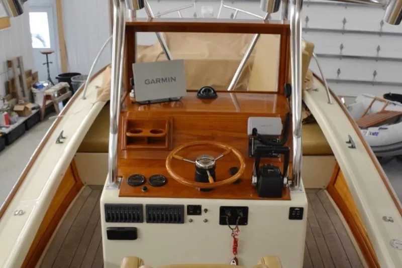 Slide: The Image of 1988 Bunker and Ellis 24 Open boat cockpit with Garmin navigation system. - 10