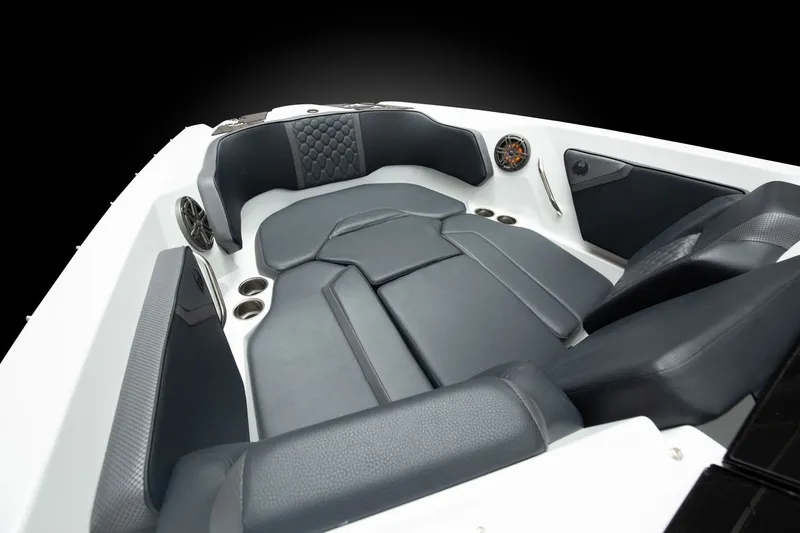 Slide: The Image of The image shows the interior of a Scarab 255 LX boat with modern, cushioned seating. - 7