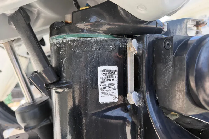Slide: The Image of Close-up of a 2022 Formula 310 Sun Sport engine component with model number label. - 23