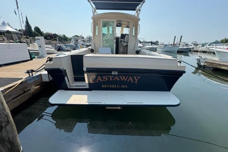 Slide: The Image of 2003 Albin 28 Tournament Express boat named "Castaway" docked in Beverly, MA marina. - 3