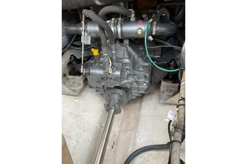 Slide: The Image of Engine compartment of a 2003 Albin 28 Tournament Express boat, showcasing mechanical components. - 17