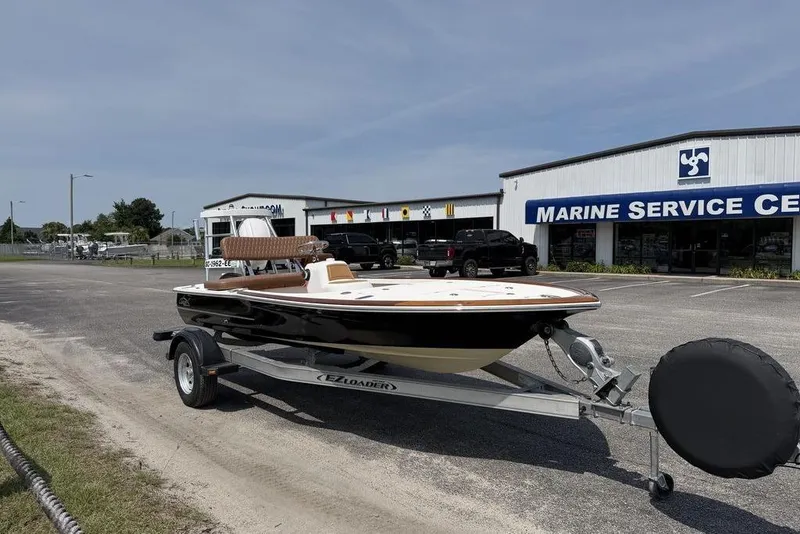 Slide: The Image of 2012 Chaos 16 Bonefish boat on trailer outside Marine Service Center. - 4
