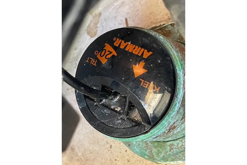 Slide: The Image of Close-up of an Airmar 20° tilt sensor on a Grady-White Freedom 325 boat. - 95
