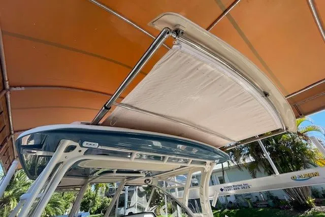 Slide: The Image of 2021 Grady-White Freedom 325 boat with retractable sunshade under canopy. - 88
