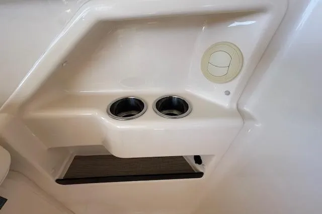 Slide: The Image of Interior detail of 2021 Grady-White Freedom 325 boat, featuring dual cup holders. - 51