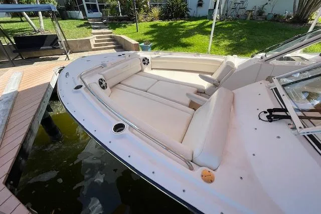 Slide: The Image of 2021 Grady-White Freedom 325 boat with spacious seating and sleek design. - 9