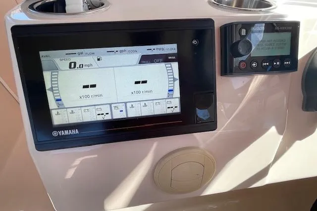 Slide: The Image of Dashboard of a 2021 Grady-White Freedom 325 boat featuring Yamaha display. - 42