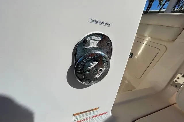 Slide: The Image of Fuel cap labeled "Diesel Fuel Only" on 2021 Grady-White Freedom 325 boat. - 99