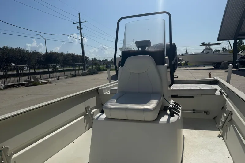 Slide: The Image of 2010 Tracker Grizzly 1860 SC Blind Duck Edition boat interior with seating and console. - 10