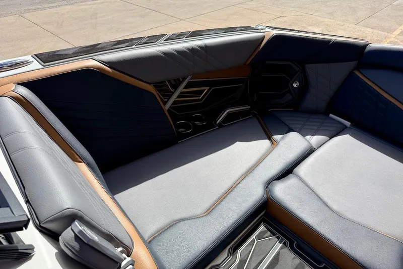 Slide: The Image of Luxurious interior seating of 2025 Tigé Ultré 25ZX boat, featuring sleek design and premium materials. - 19