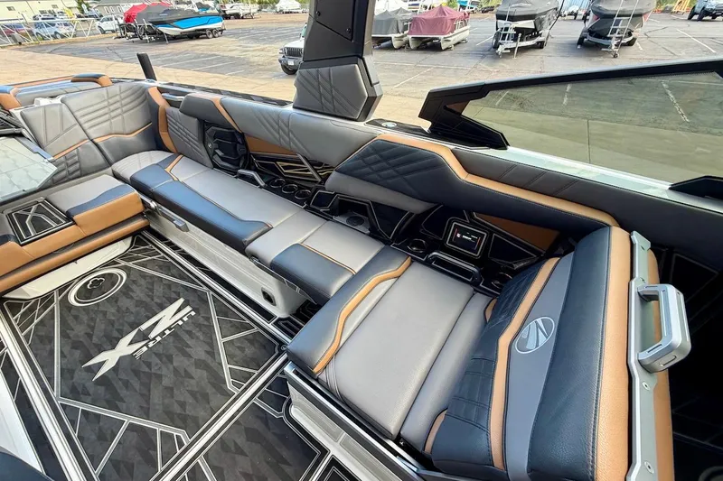 Slide: The Image of Luxurious interior of 2025 Tigé Ultré 25ZX boat with stylish seating and modern design. - 27