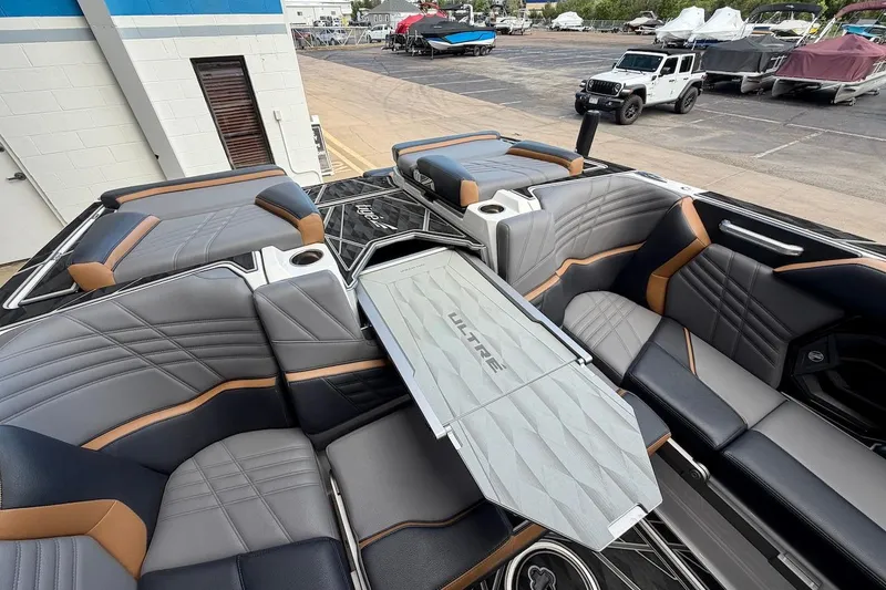 Slide: The Image of Luxurious interior of 2025 Tigé Ultré 25ZX boat with stylish seating and modern design. - 43