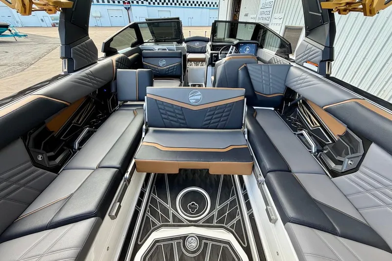 Slide: The Image of Luxurious interior of 2025 Tigé Ultré 25ZX boat with sleek seating and modern design. - 28