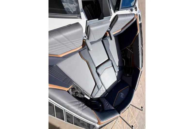 Slide: The Image of 2025 Tigé Ultré 25ZX boat interior with luxurious seating and modern design. - 20