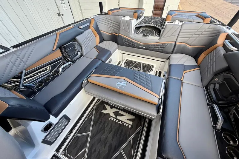 Slide: The Image of Luxurious interior of 2025 Tigé Ultré 25ZX boat with stylish seating and modern design. - 30