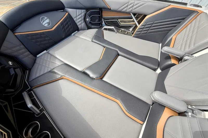 Slide: The Image of Luxurious interior of 2025 Tigé Ultré 25ZX boat with sleek, modern seating design. - 21