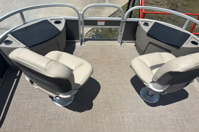 Slide: The Image of 2020 Sun Tracker Fishin' Barge 22 XP3 with beige seating and fishing stations. - 11