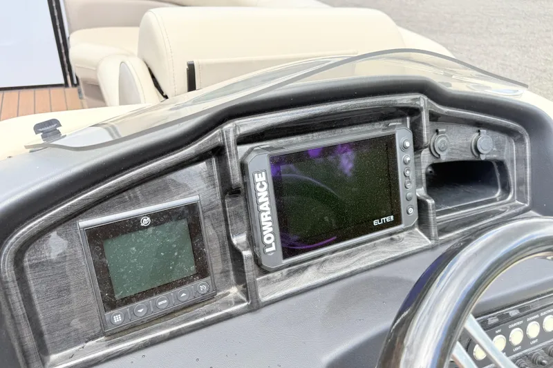 Slide: The Image of Dashboard of 2023 Bentley Pontoons 220 Elite Rear Lounger with Lowrance Elite display. - 19