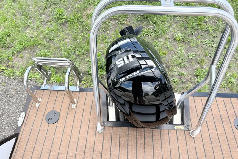 Slide: The Image of 2023 Bentley Pontoons 220 Elite Rear Lounger with Mercury 115 outboard motor and swim ladder. - 15