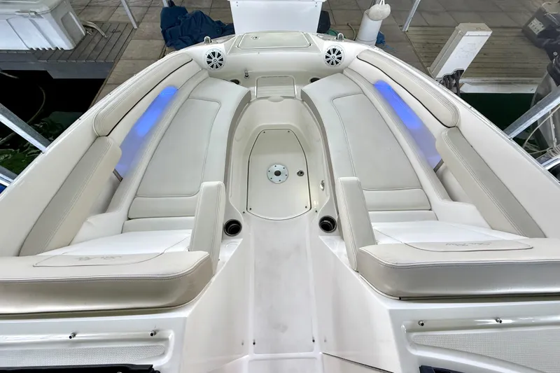 Slide: The Image of 2013 Sea Ray 260 Sundeck interior with spacious seating and modern design. - 14