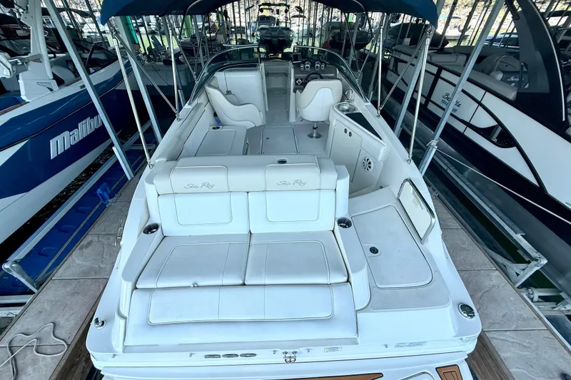 Slide: The Image of 2013 Sea Ray 260 Sundeck boat interior, featuring spacious seating and sleek design. - 12