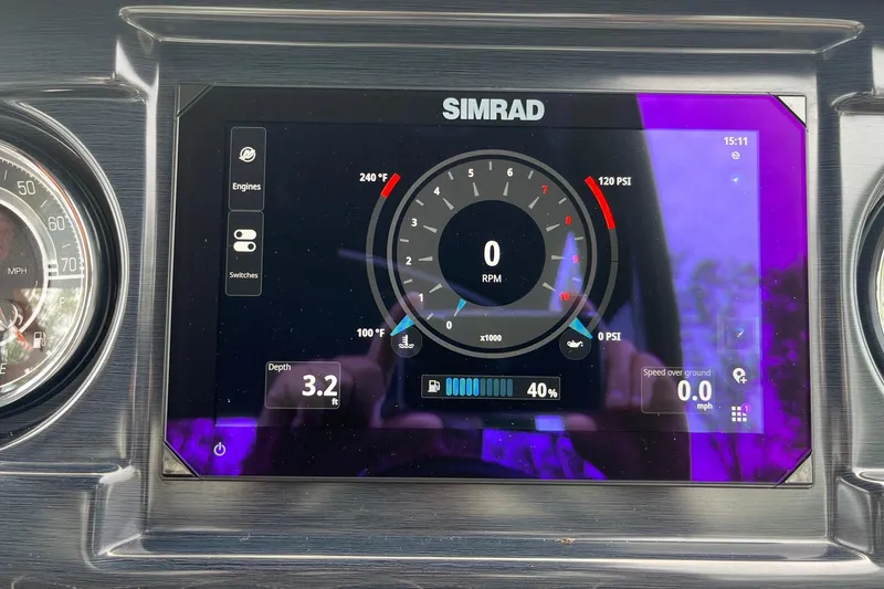 Slide: The Image of Simrad display on 2024 Harris Grand Mariner 250 showing engine metrics and depth. - 7