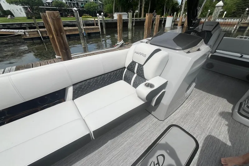 Slide: The Image of 2024 Harris Grand Mariner 250 boat interior with luxurious seating and modern design. - 15