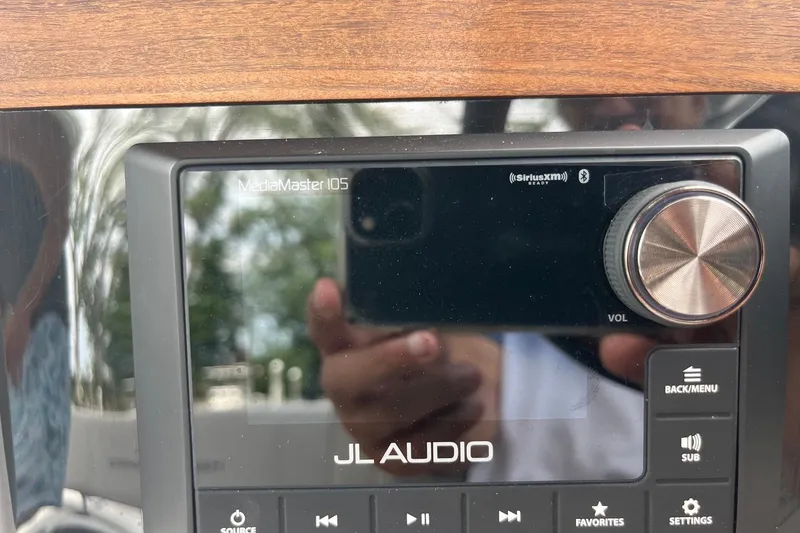 Slide: The Image of JL Audio MediaMaster 105 stereo system in 2024 Harris Grand Mariner 250 boat. - 9