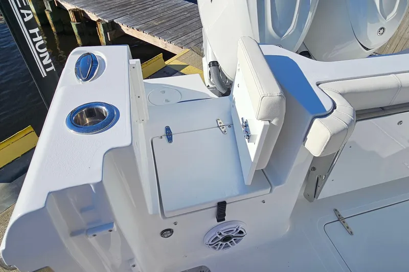Slide: The Image of 2026 Sea Hunt Gamefish 30 boat interior with seating and storage compartments. - 12