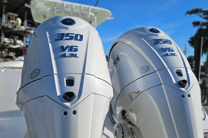 Slide: The Image of Twin Yamaha 350 V6 outboard engines on a 2026 Sea Hunt Gamefish 30 boat. - 5