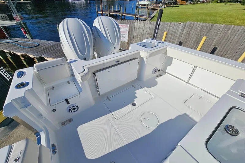 Slide: The Image of 2026 Sea Hunt Gamefish 30 boat with dual engines and spacious deck layout. - 9