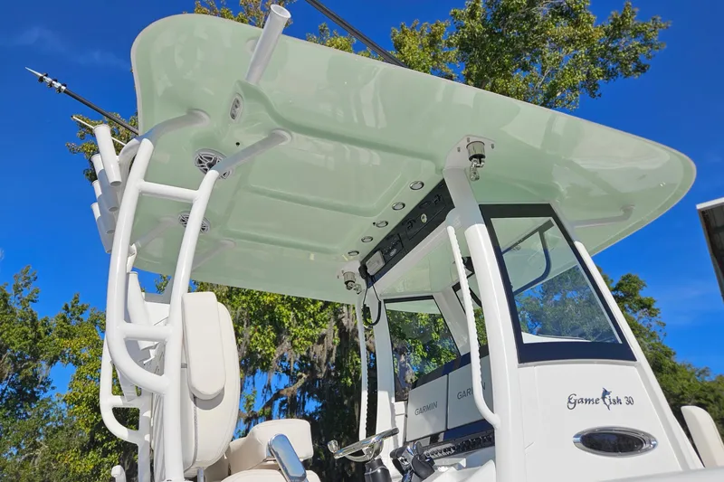 Slide: The Image of 2026 Sea Hunt Gamefish 30 boat with forward seating, featuring sleek design and modern amenities. - 4