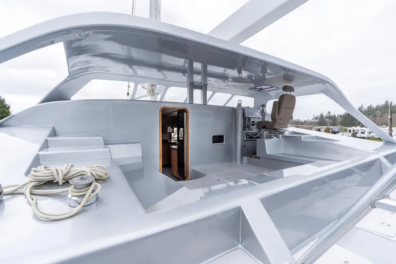 Slide: The Image of 2025 Shuttleworth 52 AeroRig yacht deck with modern design and sleek features. - 17
