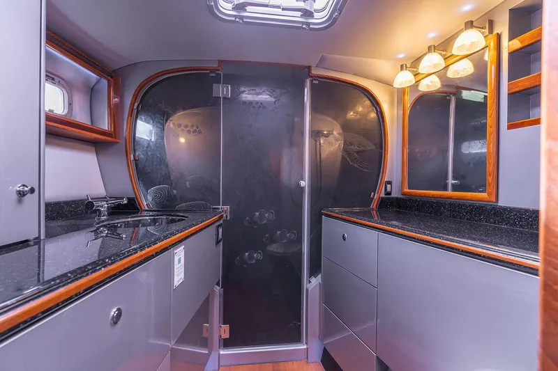 Slide: The Image of Luxurious bathroom interior of 2025 Shuttleworth 52 AeroRig yacht with modern fixtures and elegant design. - 47