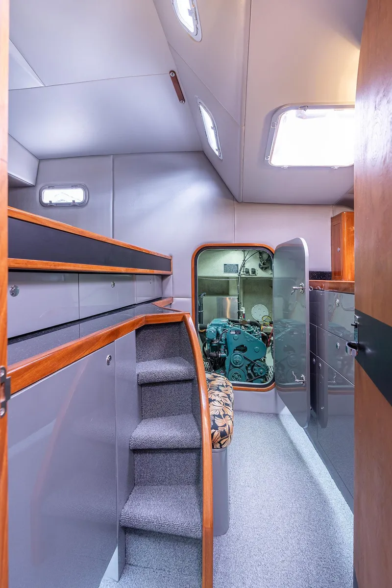 Slide: The Image of Interior of 2025 Shuttleworth 52 AeroRig yacht, featuring modern design and compact staircase. - 49