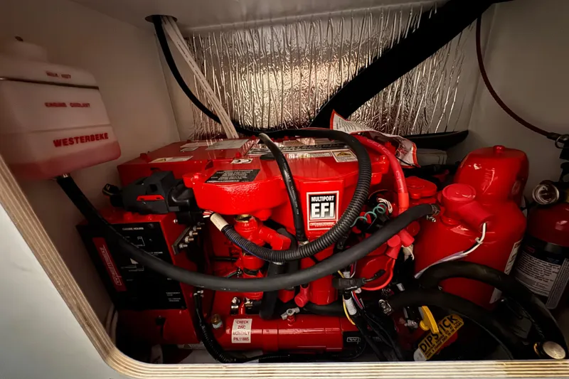 Slide: The Image of Engine compartment of 2024 Beneteau Antares 9 with Westerbeke multiport EFI system. - 25