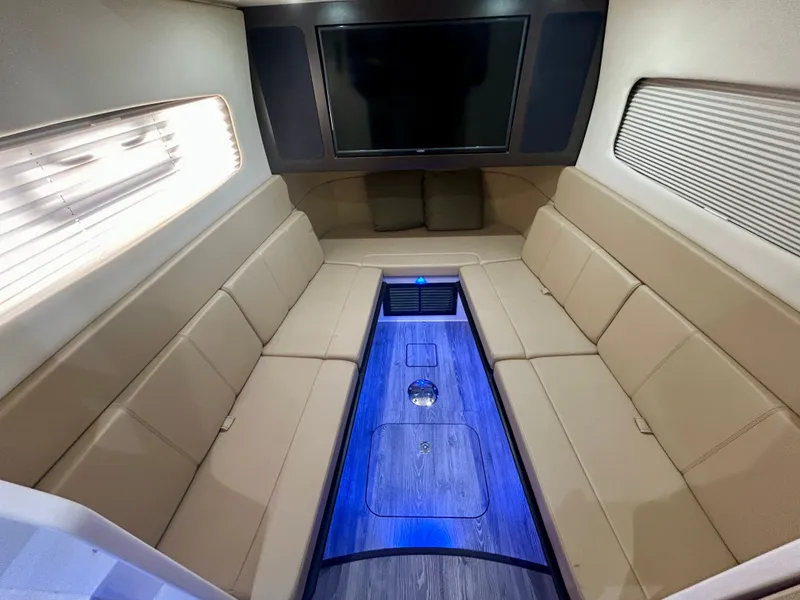 Slide: The Image of Interior of a 2021 Scout 380 with beige seating and a large screen. - 21