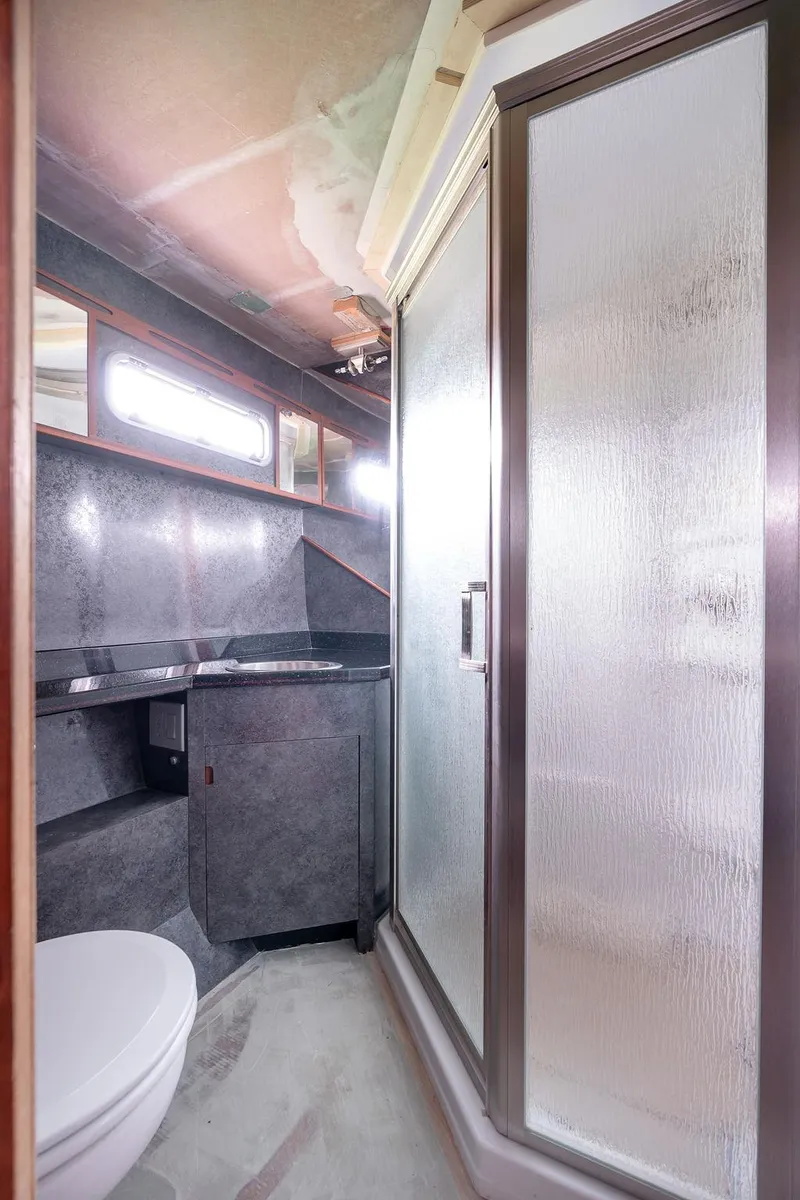 Slide: The Image of Modern bathroom in 2025 Catamaran Bloomfield 86 Motorsailor with shower and sleek design. - 45