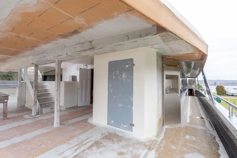 Slide: The Image of Unfinished interior of 2025 Catamaran Bloomfield 86 Motorsailor, showcasing construction details. - 22