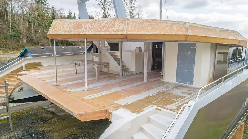 Slide: The Image of 2025 Catamaran Bloomfield 86 Motorsailor under construction, showcasing spacious deck and modern design. - 30