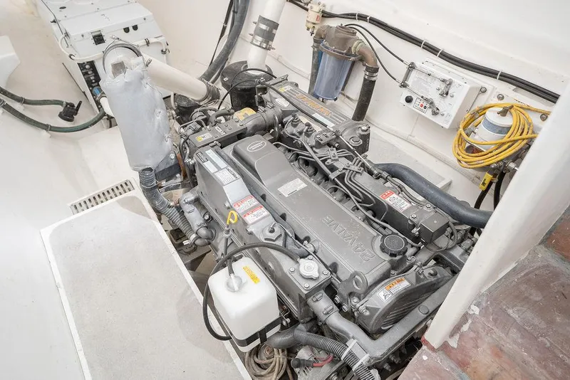 Slide: The Image of Engine room of 2025 Catamaran Bloomfield 86 Motorsailor, showcasing detailed machinery and components. - 49