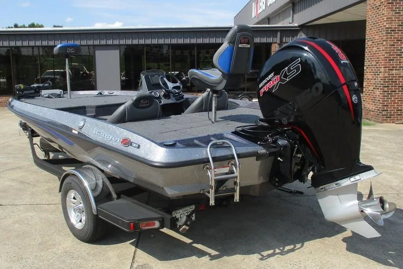 Slide: The Image of 2022 Ranger Z185 boat with Mercury Pro XS engine, parked outdoors. - 5