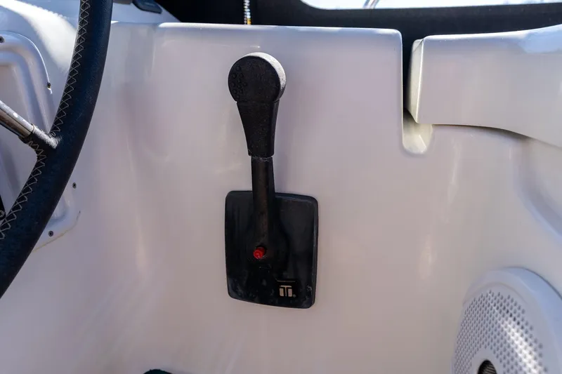 Slide: The Image of Throttle control lever on a 2013 Beneteau Oceanis 50 sailboat cockpit. - 49