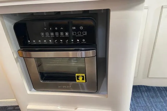 Slide: The Image of Built-in microwave oven in 1994 Cruisers Yachts 3675 Esprit kitchen area. - 13