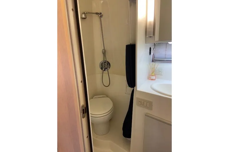 Slide: The Image of Bathroom interior of 1994 Cruisers Yachts 3675 Esprit with shower and toilet. - 17