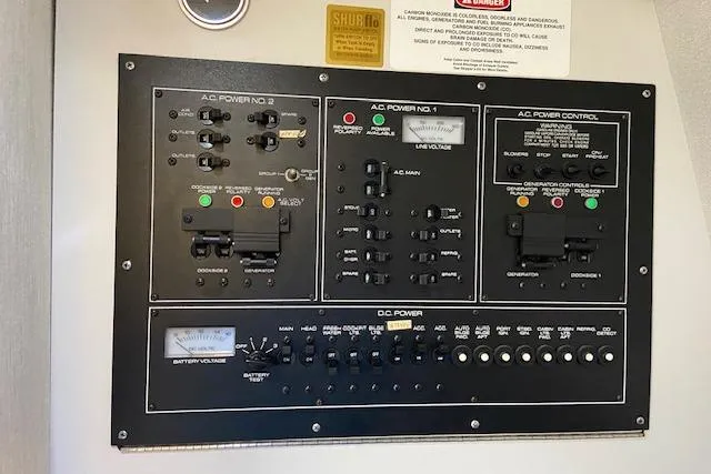 Slide: The Image of Electrical control panel on a 1994 Cruisers Yachts 3675 Esprit boat. - 18